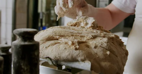 Close-up of a baker making sourdough bread 4K. Video stock 221562314