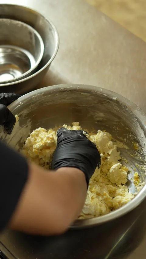 Close-Up of Bakers Hands Kneading Dough for Bread or Pastry Recipe Stock Footage 285642234