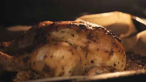 Close-up of baking hot grill chicken legs in the oven. Roasted chicken meat Stock Footage 152328601