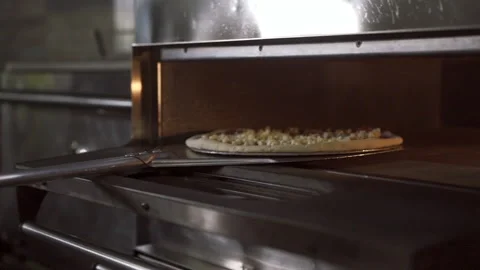 Close-up of baking Italian pizza before serving Stock Footage 150417124