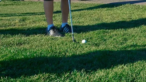 Close up of ball chipped out of rough Stock Footage 104298810
