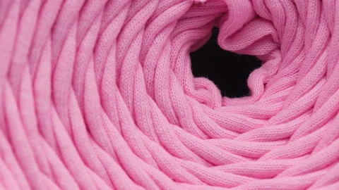 Close up of a ball of cotton knitting thread, rotation in circle. Stock Footage 232898596