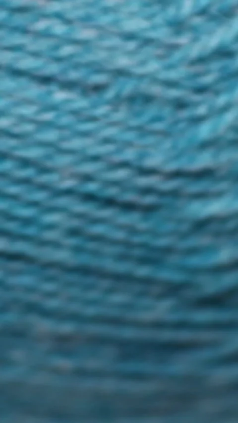 A close up of a ball of yarn, ideal for textile or craft related uses. Rota.. Stock Footage 344158498