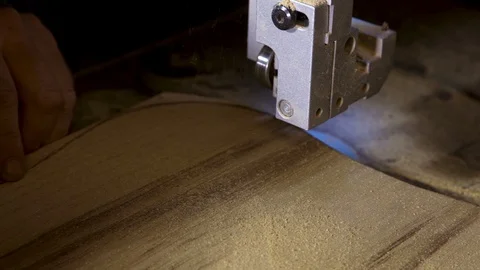 Close - up band saw cuts the shape of the kitchen Board Stock Footage 100746868