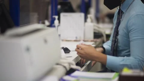 Close Up of Bank Employee Hands Working at Counter Stock Footage 344235889