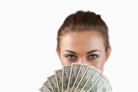 Close up of bank notes being held by businesswoman Stock Photos