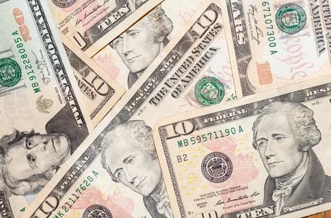 Close-up banknotes of 20 and 10 US dollars, top view. Cash exchange currency, Stock Photos