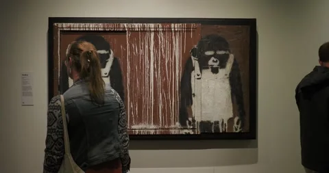 Close-up of Banksy monkeys artwork at Moco Museum Stock Footage 300617488