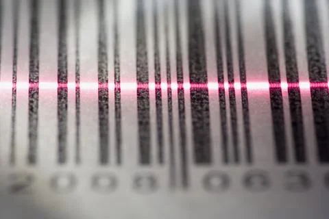 Close-up of a bar code being scanned with a laser light Stock Photos