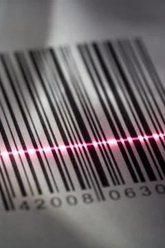 Close-up of a bar code being scanned with a laser light Foto stock