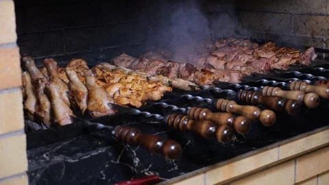 Close-up of a barbecue being prepared on a barbecue grill in a restaurant. Stock Footage 320877650