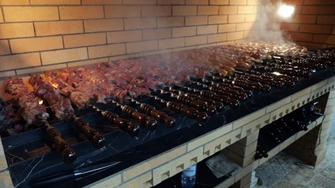 Close-up of a barbecue being prepared on a barbecue grill in a restaurant. Stock Footage 339787703