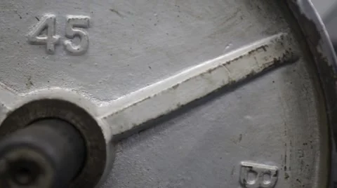 Close-up of barbell and mid section of man in gym Stock-Footage 51783468