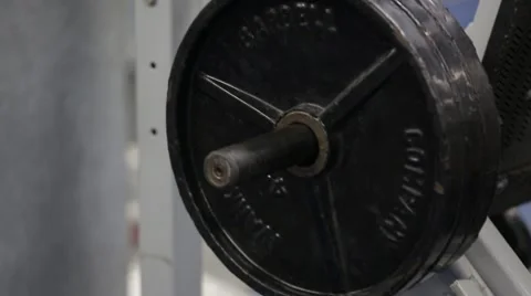 Close-up of barbell on weight lifting machine Stock-Footage 51784916