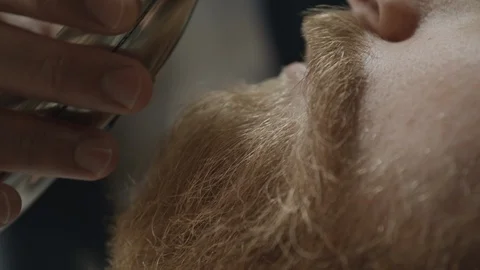 Close up of barber cutting a man's moustache with a trimmer. Stock Footage 117721091