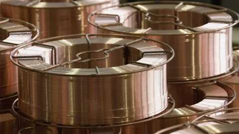 Close up of the bare bright copper wire on the spool Stock Footage 96077401