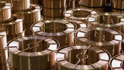 Close up of the bare bright copper wire on the spool Stock Footage 96077919