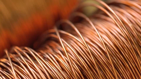 Close up of the bare bright copper wire on the spool, Rack focus Stock Footage 104278721