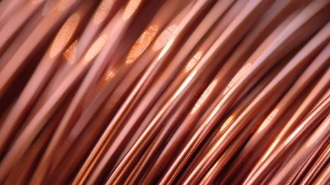 Close up of the bare bright copper wire on the spool, Rack focus Stock Footage 104320934