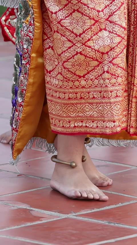 Close Up of Barefoot Thai Dancer in Traditional Red Gold Silk Costume Stock Footage 338424777