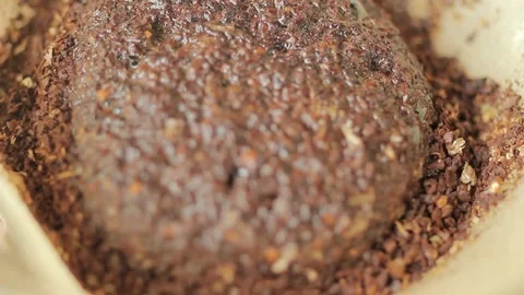 Close-up barista brewing Coffee roasting process in small roaster factory 스톡 동영상 334643590