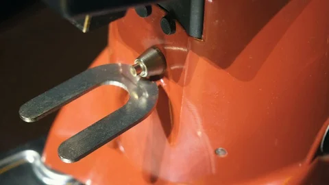 Close up of barista hand inserts a holder into a coffee grinder Stock Footage 127586737