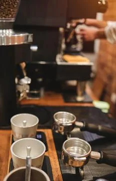 Close up barista hand making a cup of coffee. Stock Photos