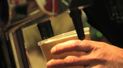 Close Up of Barman Pouring Pint of Beer - Nightlife, Clubbing, Alcohol HD Stock Footage 10688762