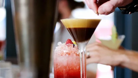 Close Up Of Barman Serving Espresso Martini Cocktail In Bar Stock Footage 100050026