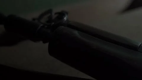 Close-up of the barrel of the machine gun lying on the table Stock Footage 206058916