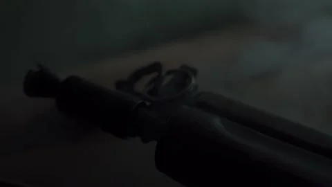 Close-up of the barrel of the machine gun . smoke from the explosion. Stock-Footage 206058811
