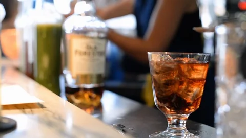 Close-up of bartender making cocktails with bourbon Stock Footage 113724239