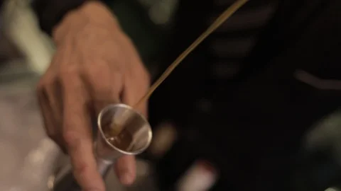 Close Up Of Bartender Using Jigger Stock Footage 129781149