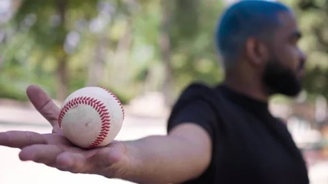 Close-up of baseball ball in hands of african american black man 스톡 동영상 287488934