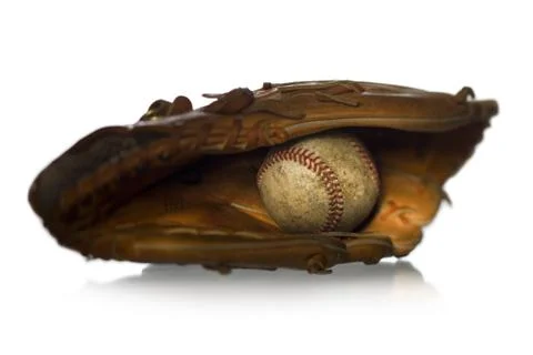 Close-up of a baseball in a baseball glove Stock Photos