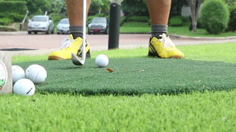 Close-up of basic golfer learning to use putter Video stock 49149536