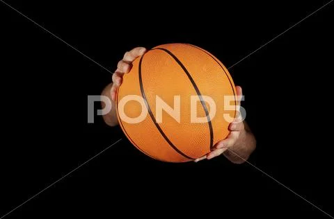 Close Up Of Basket Ball Being Held