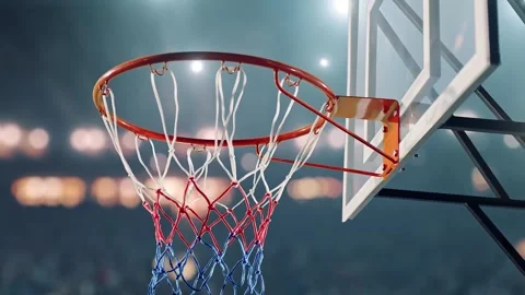 Close-up of Basketball Falling Through Circular Rim and Net 4K Stock Footage 339268336