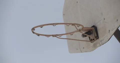 Close Up on Basketball Hoop with Palm Tree In Background  - Crash Zoom In Stock Footage 89943014