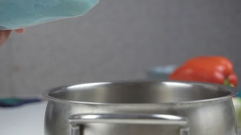 Close-up of basmati rice falling into the pan Video stock 111957233