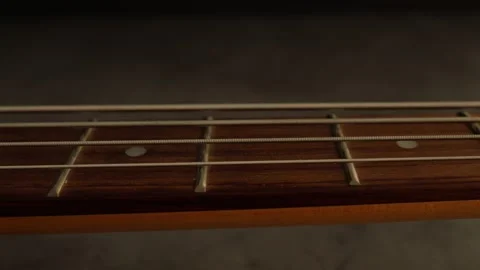 Close up of a bass guitar, strings Video stock 280381983