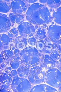 Close Up of Bath Water Bubbles Foam For Background In Rainbow Stock Photos