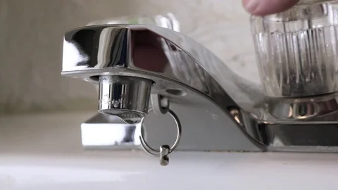 Close Up Bathroom Faucet On and Off Stock Footage 101672335