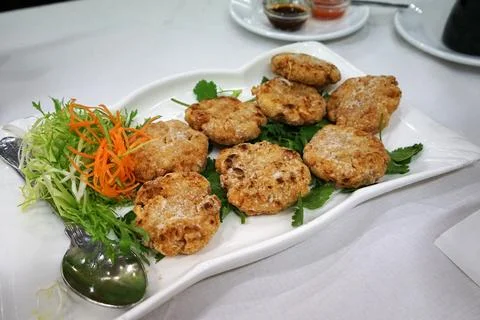 Close up battered and deep fried fish cake Stock Photos