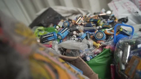 Close-up batteries in the collection container Stock Footage 137101776