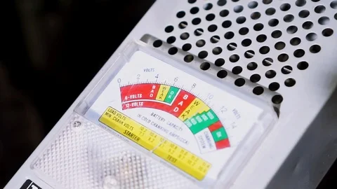 Close up of battery capacity tester voltmeter. Footage. Video stock 126567936