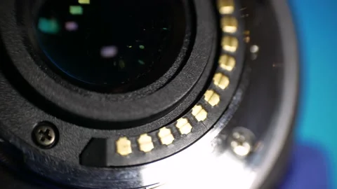 Close-up bayonet mount camera lens with contacts professional service Stock-Footage 130874876