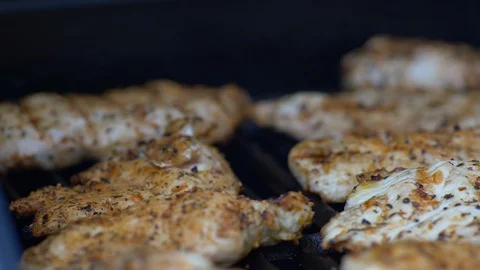 Close Up of Bbq Chicken Breast On A Grill Stock-Footage 130159688