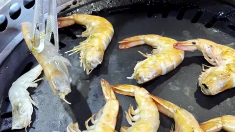 Close Up BBQ Shrimp Grilling on Hot Pan Stock Footage 340413371