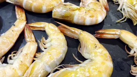 Close Up BBQ Shrimp Grilling on Hot Pan Stock Footage 340413396